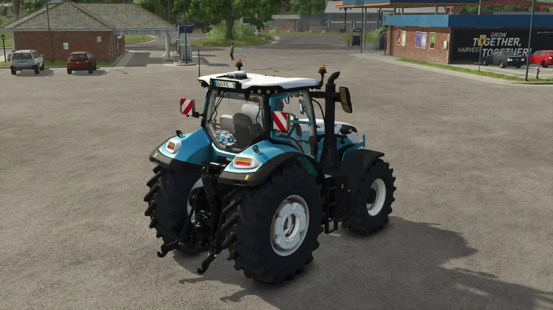 FS25 mod: Steyr Absolut Dolphin Edition tractor with blue and white design in Farming Simulator 25.