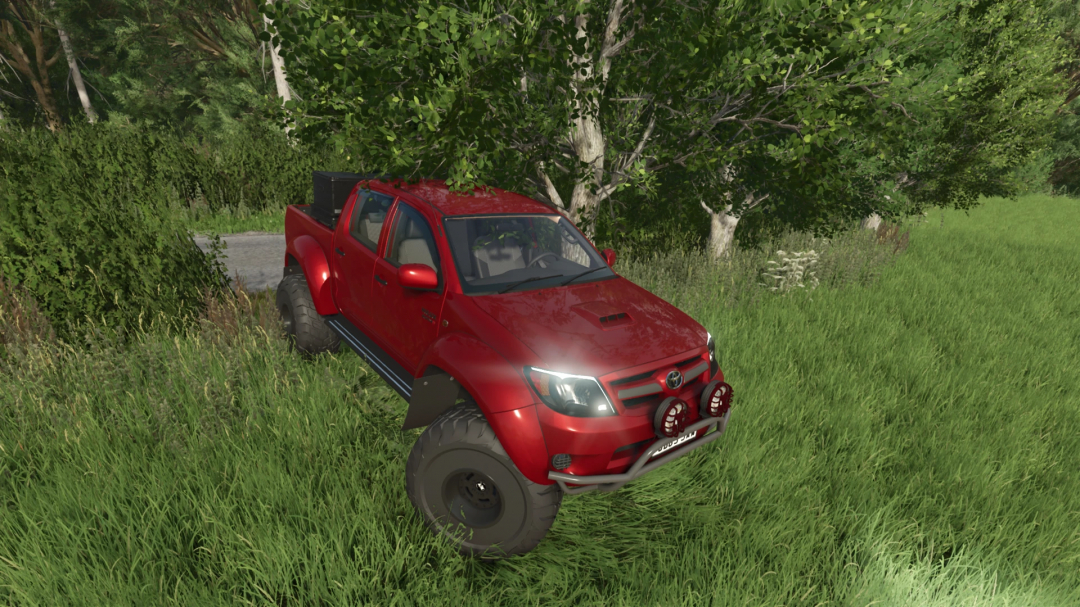 Toyota Hilux AT38 mod in Farming Simulator 25, parked on grass near trees. FS25 mods enhance gameplay realism.