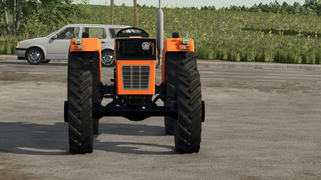 Front view of UTB U640 DTC tractor mod in Farming Simulator 25, showcasing its design and features on a road background.