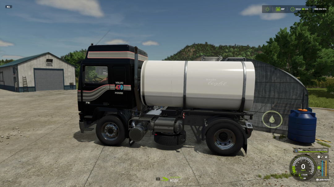 Volvo F16 V1.0.0.2 mod in FS25, featuring a black truck with a white tank trailer, set outdoors near a building.