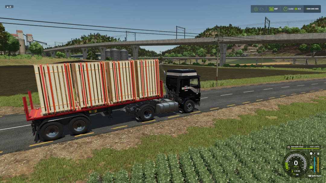 Volvo F16 truck mod in FS25 transporting wood panels on a road.