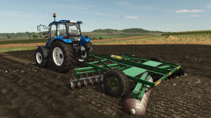 fs25-mods, FS25 mod Efe Disc v1.0.0.0 shows a blue tractor with a green disc harrow in a field.