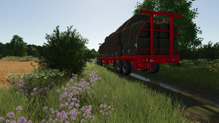 fs25-mods,  FS25 mod La Campagne PL12 trailer on a grassy path, surrounded by fields and wildflowers.