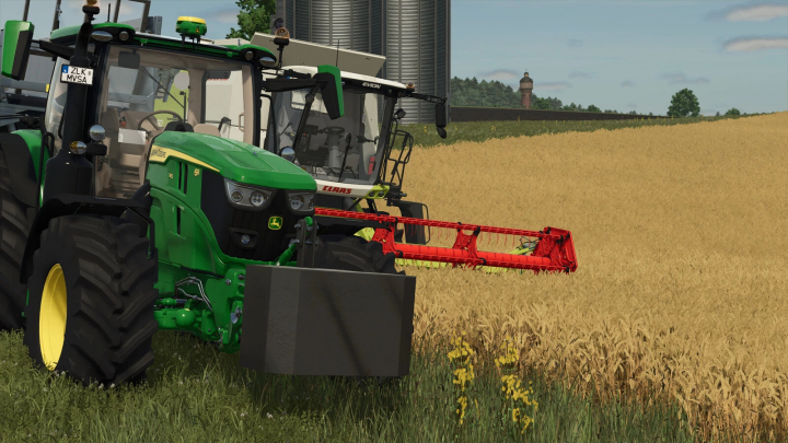 fs25-mods,  FS25 mod Selfmade Concrete Weight on a green tractor in wheat field.