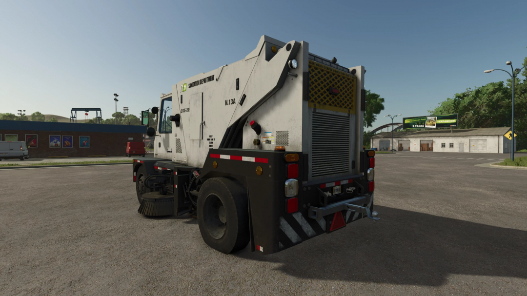 21XE205 Sweeper mod in FS25 showing a street sweeper vehicle parked in a lot, highlighting its design and features.