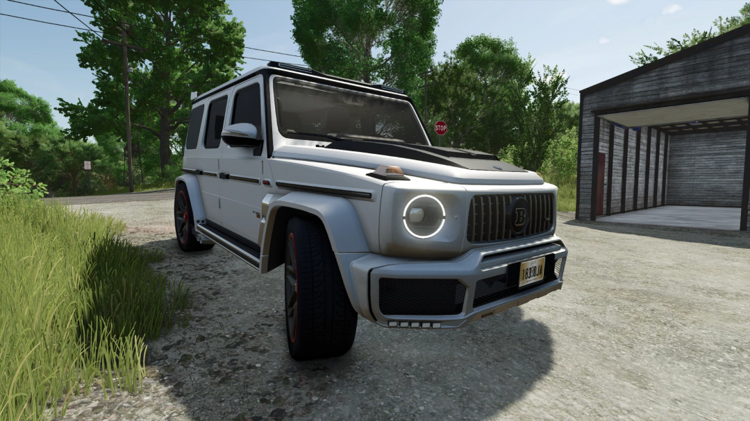 Brabus G800 mod in FS25 parked by a garage, showcasing its design.