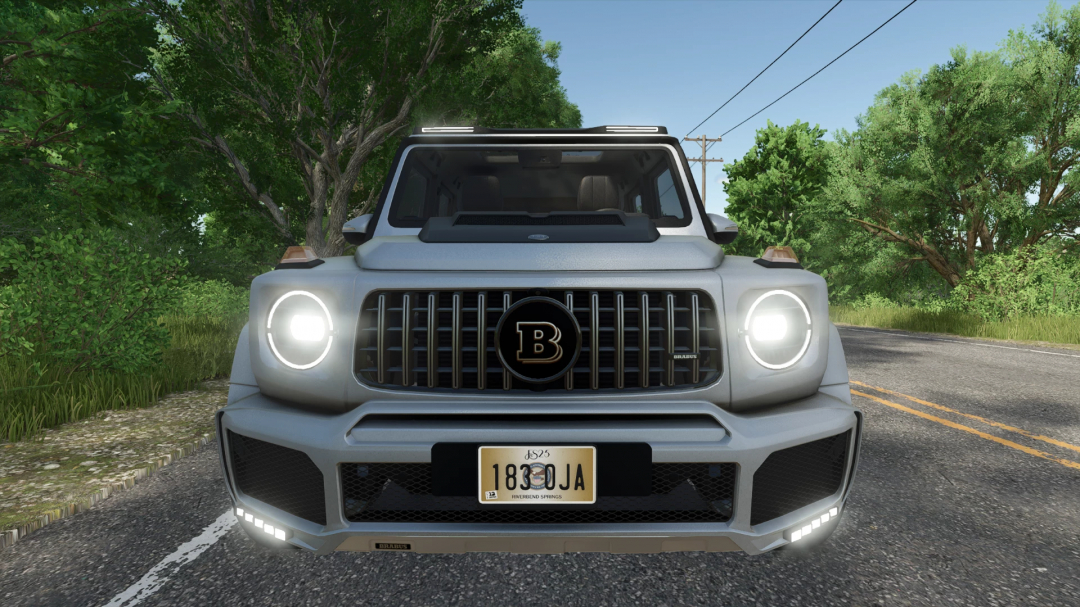 Front view of the Brabus G800 mod in FS25, showcasing its distinctive grille on a rural road. Farming Simulator 25 mods.