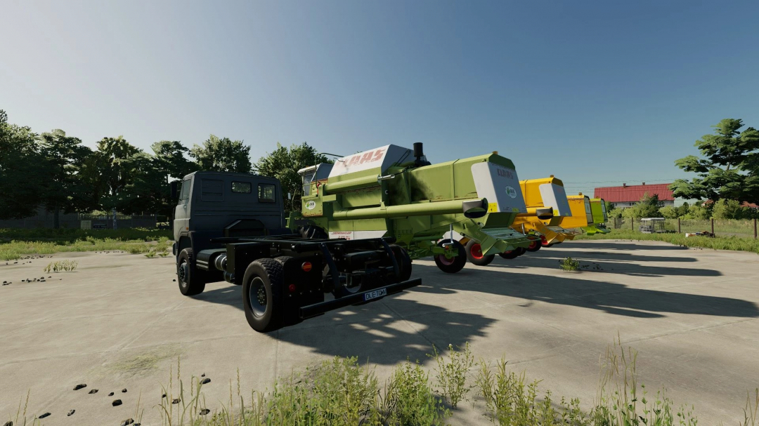 CLAAS combine harvesters and a truck in a farm setting in FS22 mod, showcasing the CLAAS combine harvesters Pack v1.5.0.0.