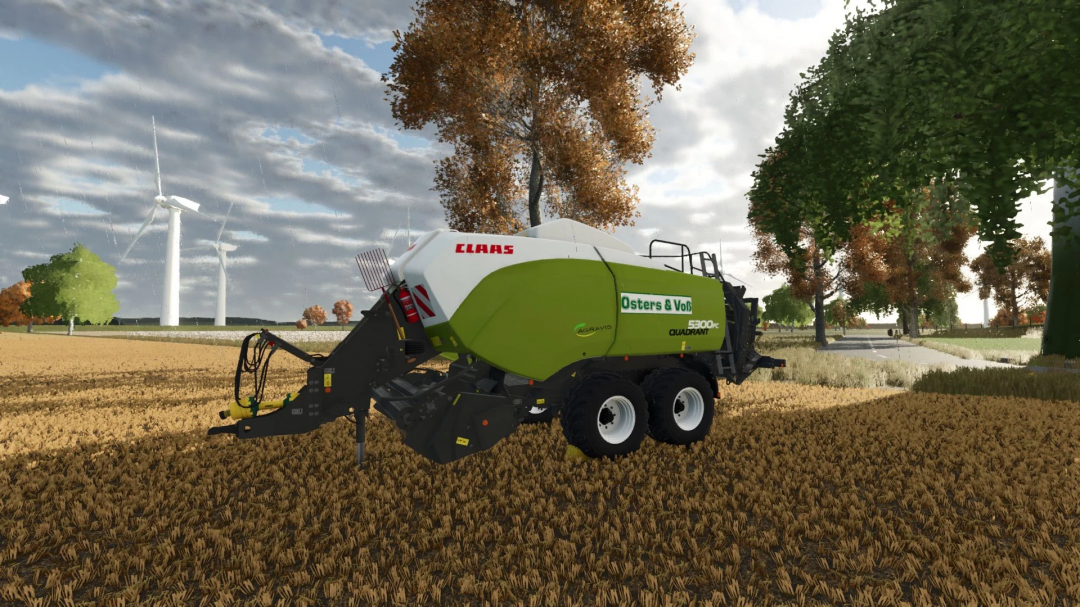 Claas Quadrant 5300PC mod in FS25, showcasing detailed agricultural machinery against a scenic field with wind turbines.