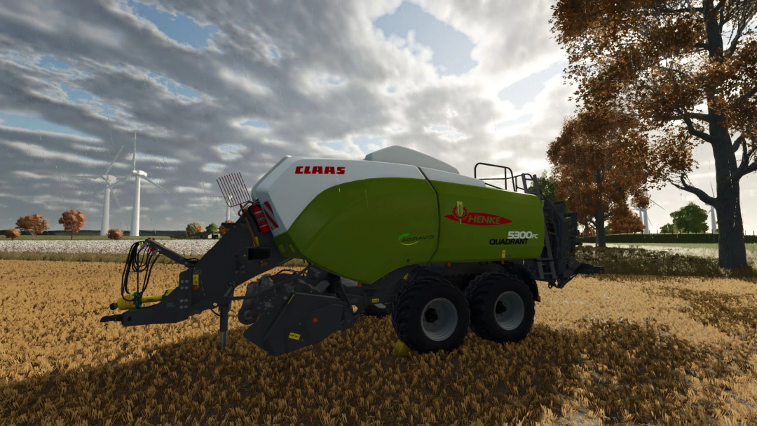 Claas Quadrant 5300PC mod in FS25, a baler in a field with wind turbines in the background.