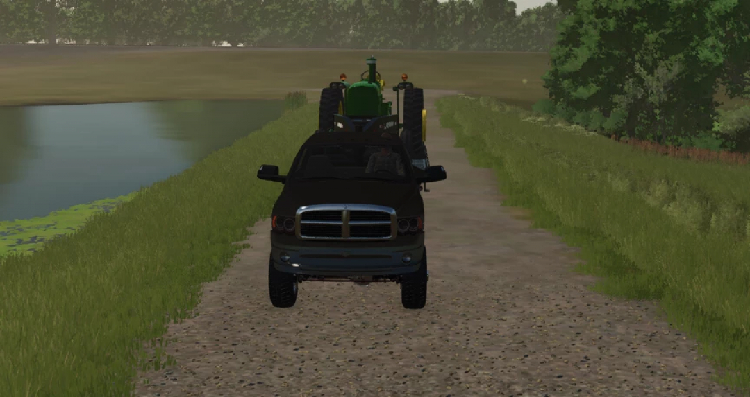 Dodge 3500 V1.0.0.0 mod in Farming Simulator 25 with a trailer carrying a tractor on a rural road.