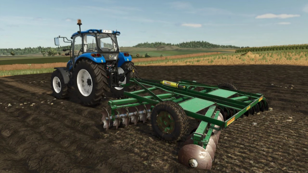 FS25 mod Efe Disc v1.0.0.0 shows a blue tractor with a green disc harrow in a field.