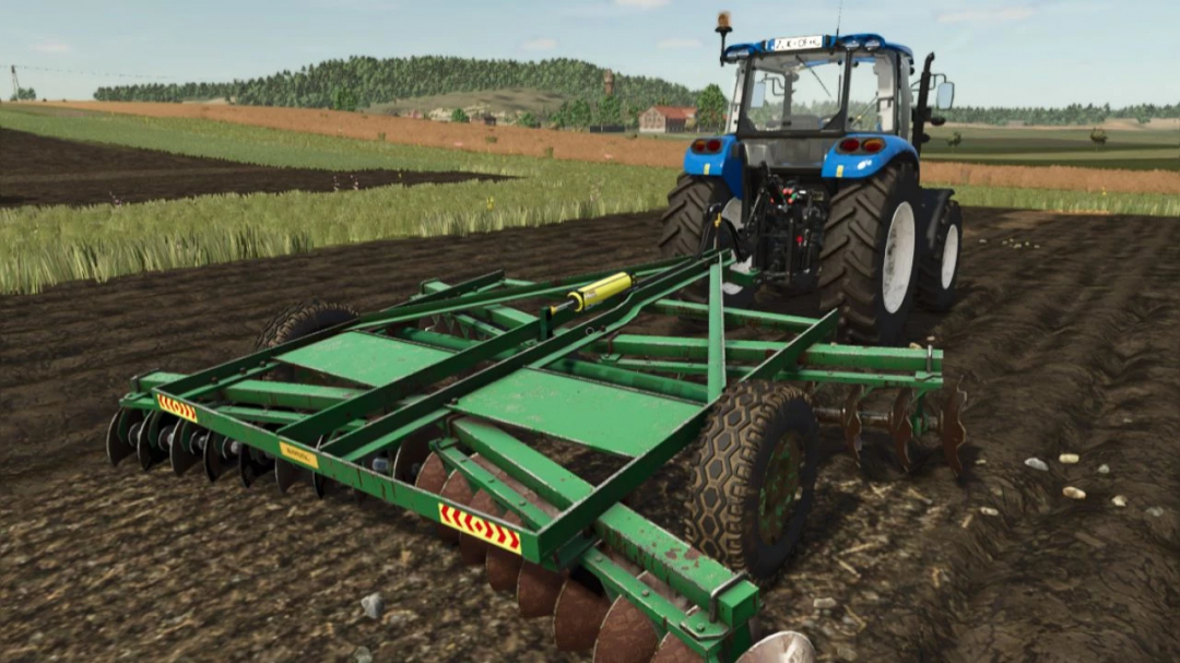 FS25 mod Efe Disc v1.0.0.0 with a green disc harrow attached to a blue tractor in a field. Farming Simulator 25 mods.