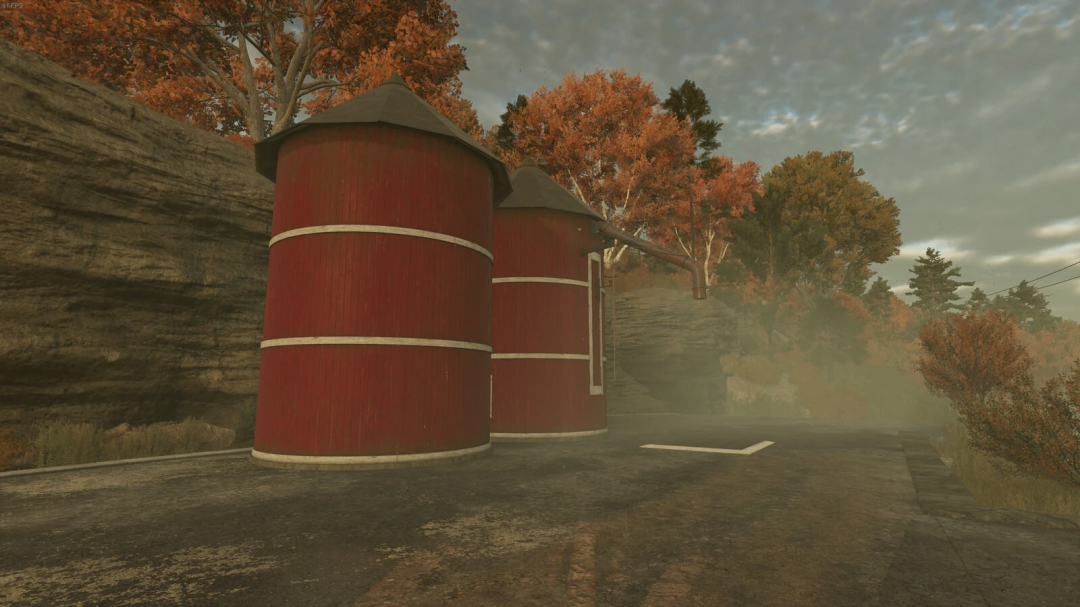 Large red silos with autumn foliage in FS25 Extended Farmsilo Shop Display mod.