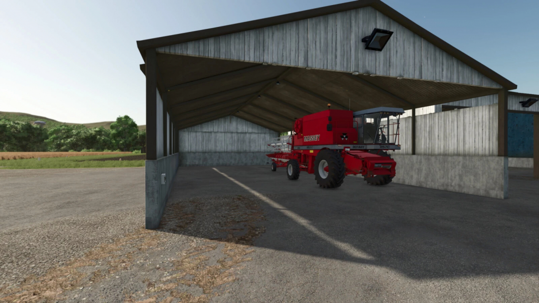 FS25 mods image showing red harvester inside Machinery Garage from Farming Simulator 25.