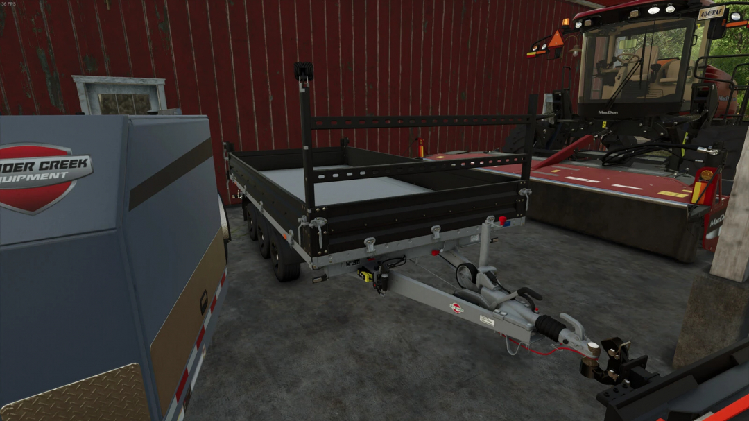 Skid Steer Bumper Hitch Adapter v1.0.0.0 mod in FS25, showing equipment in a farm setting.