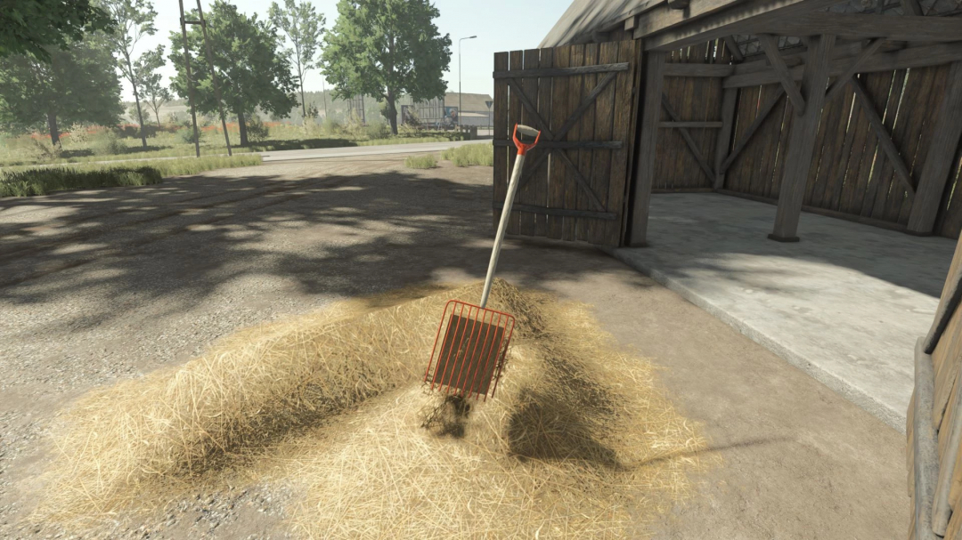 Straw fork mod in FS25 against a barn backdrop, enhancing Farming Simulator 25 gameplay.