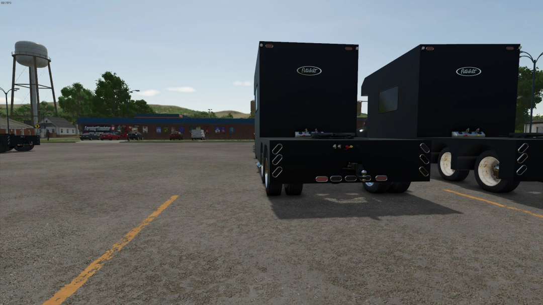 FS25 mod Toter HOME HAULER v1.0.0.0 parked in a virtual lot with a water tower and buildings in the background.