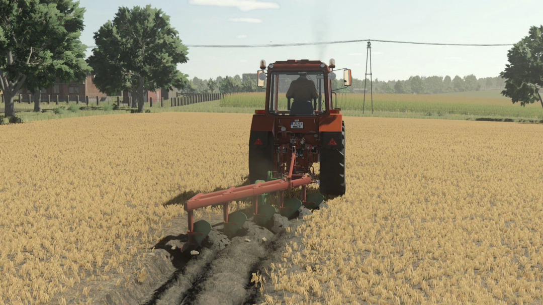 FS25 mod Unia U-022-25/1 Pack used by a tractor plowing a field, enhancing farming realism in Farming Simulator 25.