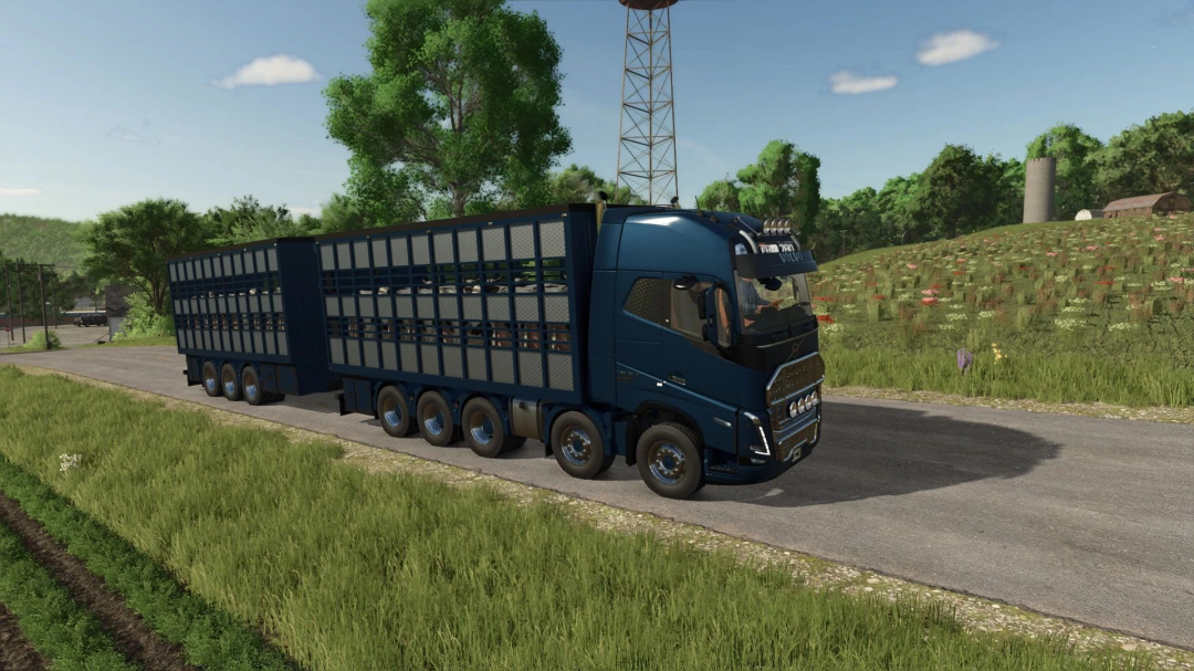 Volvo animal transport truck mod in FS25 on a scenic rural road.