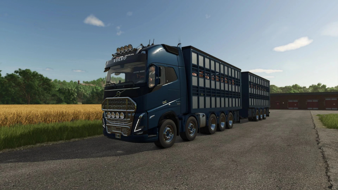 Volvo animal transport truck mod in FS25, parked near a wheat field.