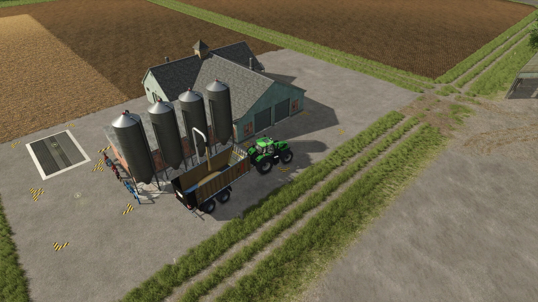 Overhead view of the Wholesale v1.0.0.0 mod in FS25 showing a farm with silos and a tractor unloading grain.