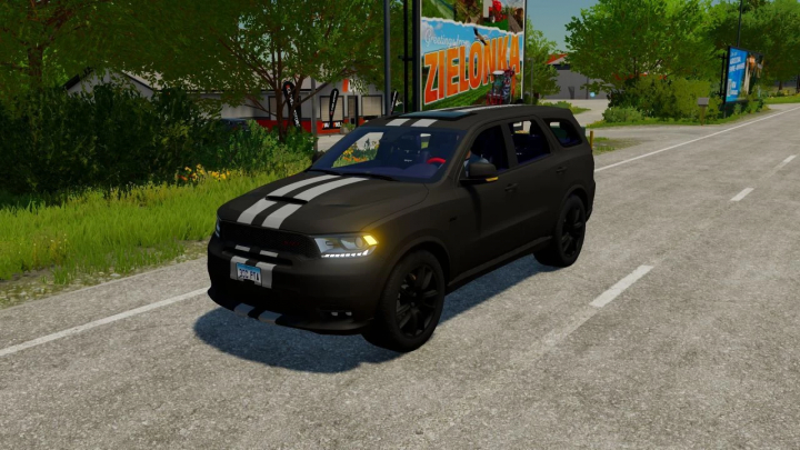 fs22-mods,  Dodge Durango SRT mod in FS22, parked on a rural road with greenery and a signboard in the background.