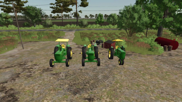 fs25-mods, Three John Deere 5020 tractors mod in FS25 game, displayed on a farm path surrounded by greenery. Farming Simulator 25 mods.