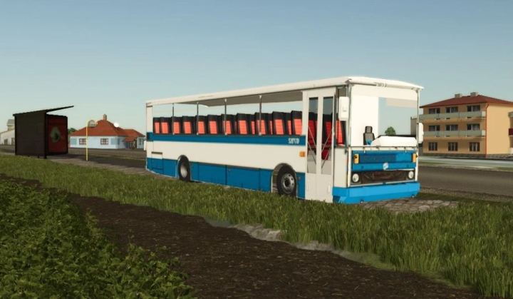 fs25-mods, Karosa C 735 bus mod in Farming Simulator 25, parked beside a road with a bus stop and buildings in the distance.