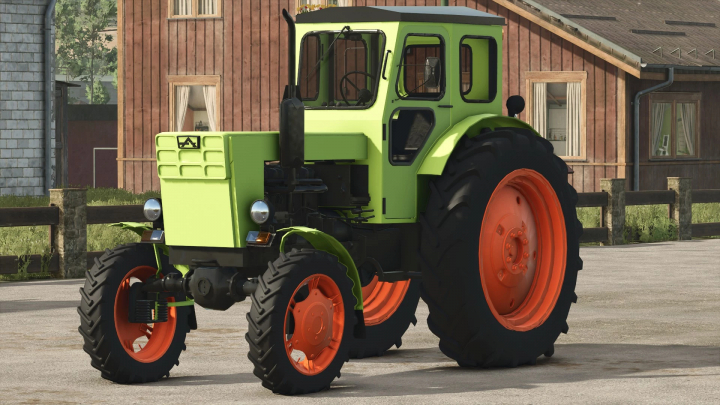 fs25-mods, LTZ T40AM tractor mod for FS25 with green body and orange wheels, parked in front of a wooden building.