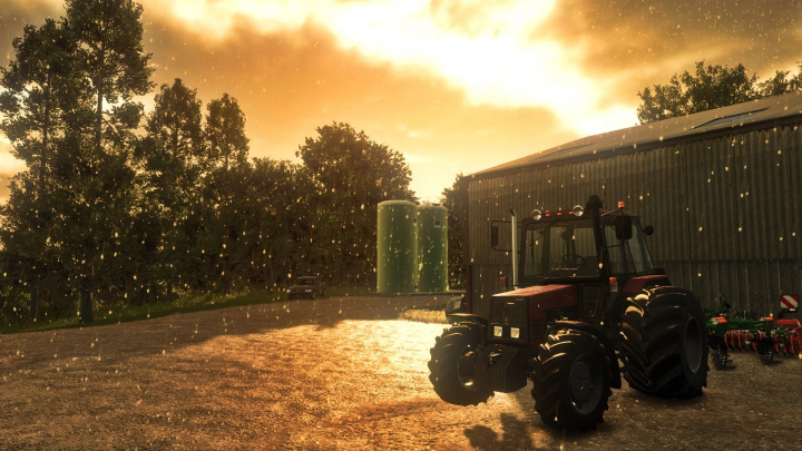 fs25-mods,  MTZ 892.2 tractor mod for FS25 in a farmyard at sunset, with trees and a barn in the background.