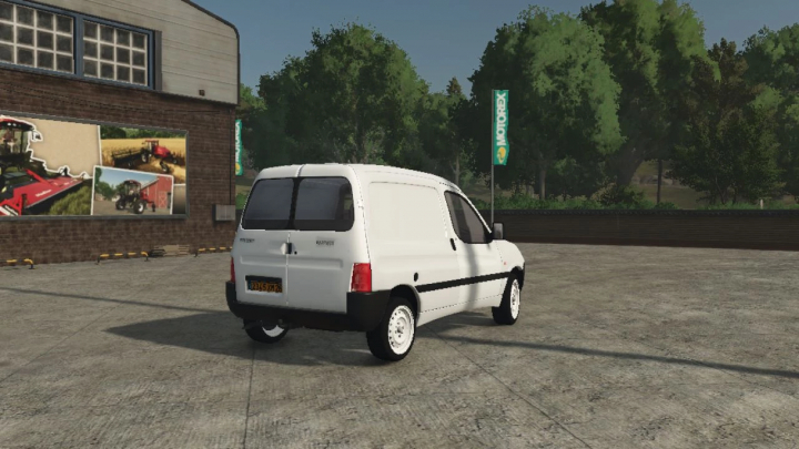 fs25-mods,  Peugeot Partner mod in FS25 with white van parked in front of a garage, enhancing Farming Simulator 25 gameplay.