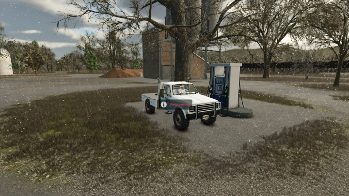 fs25-mods,  FS25 mod image showing a placeable gas station pump next to a white truck on a snowy day.