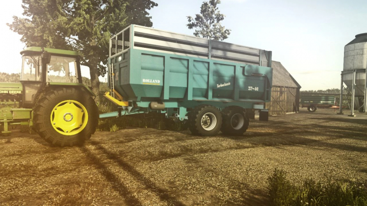 fs25-mods, FS25 mod Rolland Turboclassic 27-40 trailer attached to a tractor on a farm.