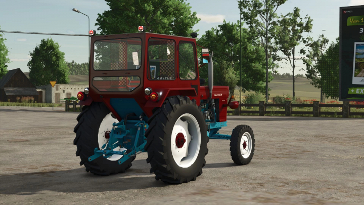 fs25-mods,  Red and blue UTB 650 VMR tractor in FS25 mod, parked on a farm road.