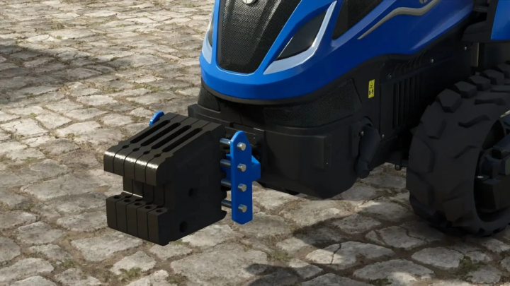 fs25-mods, FS25 mod Universal Weight II v1.0.0.0 attached to a blue tractor on cobblestone pavement.