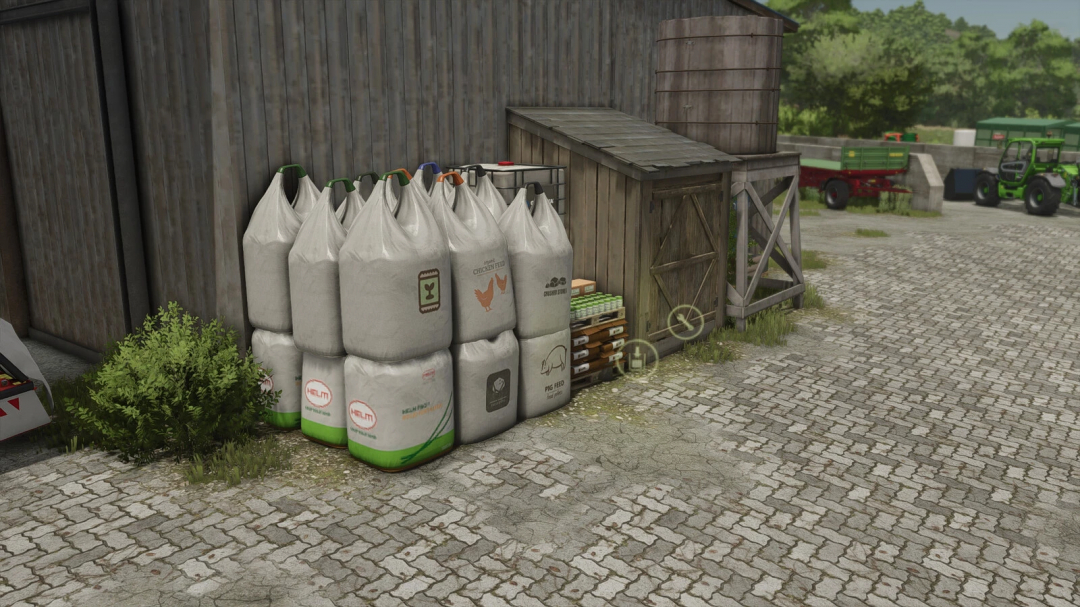 FS25 mods BigBag Tank v1.0.0.0 showcasing large storage bags beside a rustic shed.