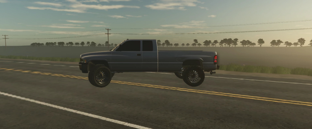 Dodge 2500 Ross Modding v1.0.0.0 mod for FS25 on a country road in Farming Simulator 25.