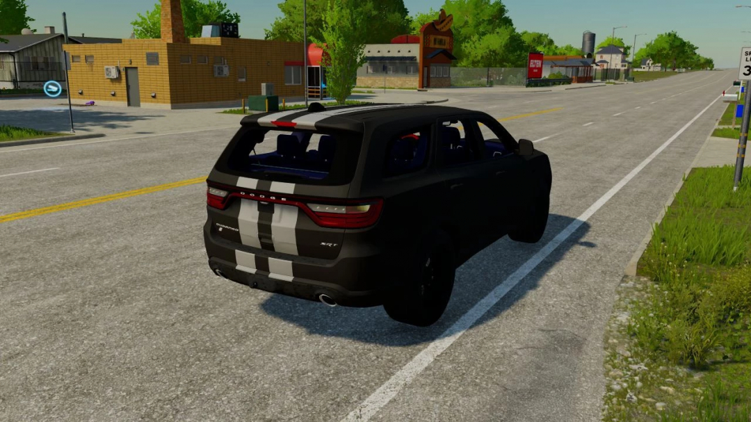 Dodge Durango SRT mod in FS22, parked on a road with buildings and greenery.