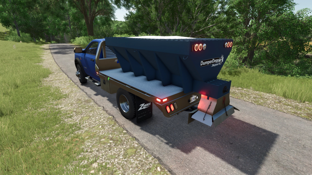 Dodge Ram 5500 mod in FS25 with custom DumperDogs attachment on a rural road.