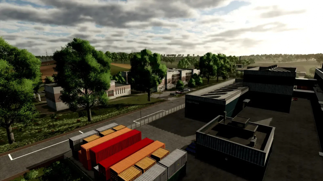 Aerial view of industrial area in FS25 Oltenbug mod featuring warehouses and shipping containers.