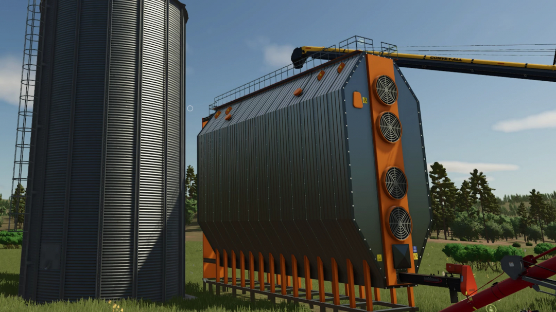 FS25 Grain Dryer mod in Farming Simulator 25 featuring a large drying unit next to a storage silo.