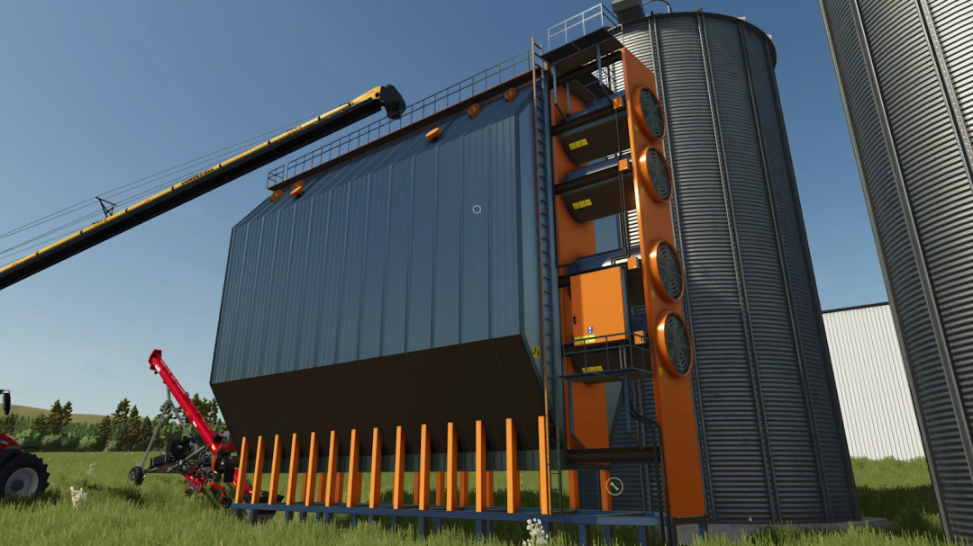 FS25 Grain Dryer v1.0.0.0 mod showing a large industrial grain dryer beside silos in Farming Simulator 25.