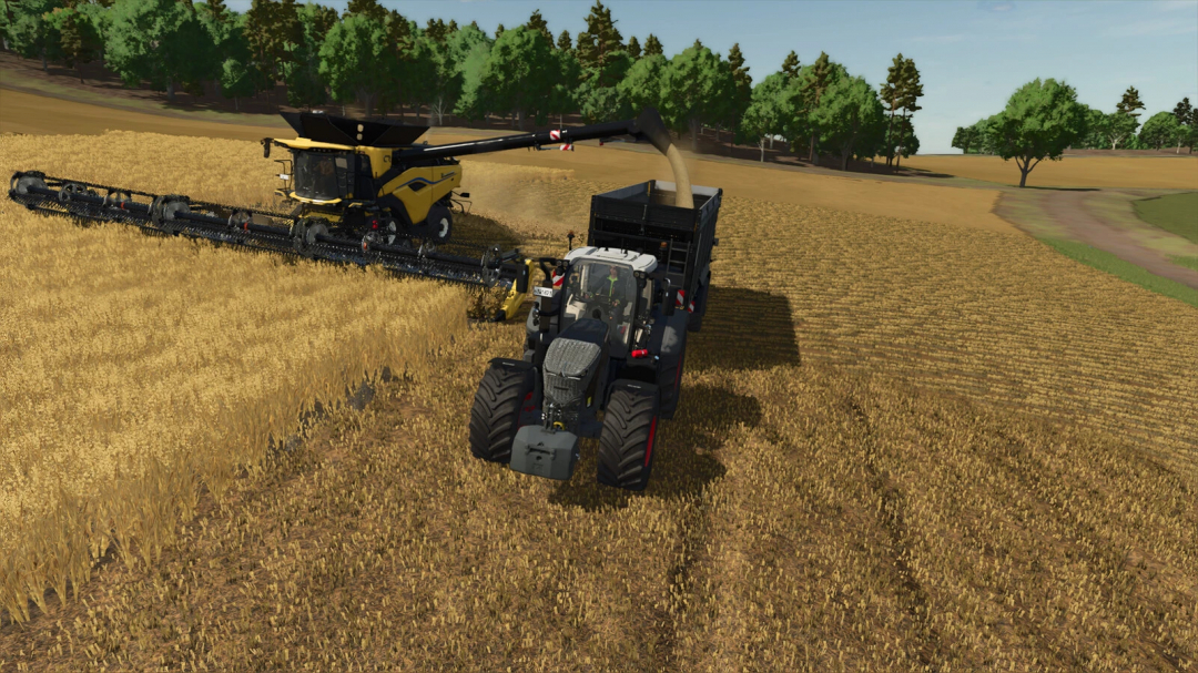 FS25 mod Filllevel Warning v1.0.0.0 shows a tractor unloading grain from a harvester in a wheat field.