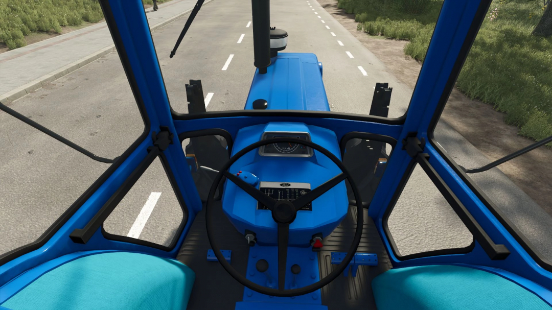 Interior view of Ford 6600 tractor in FS25 mod, showing dashboard and steering on a rural road.