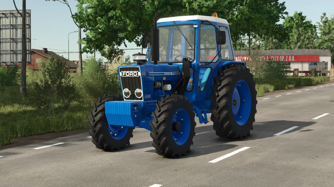 Ford 6600 tractor mod in FS25, blue and white design, parked on a road by trees and buildings.