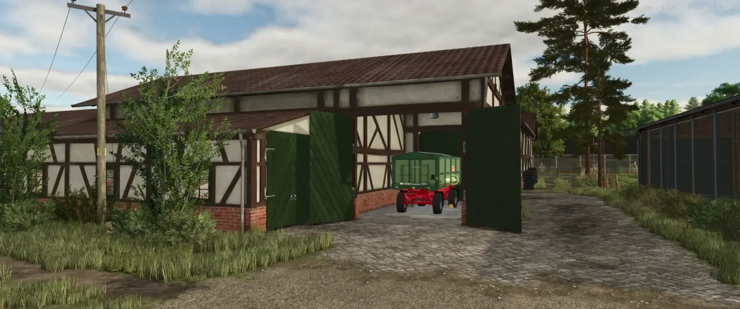 Half timbered building with barn in FS25 mods, Eifel style, with green doors open, showing farm equipment inside.