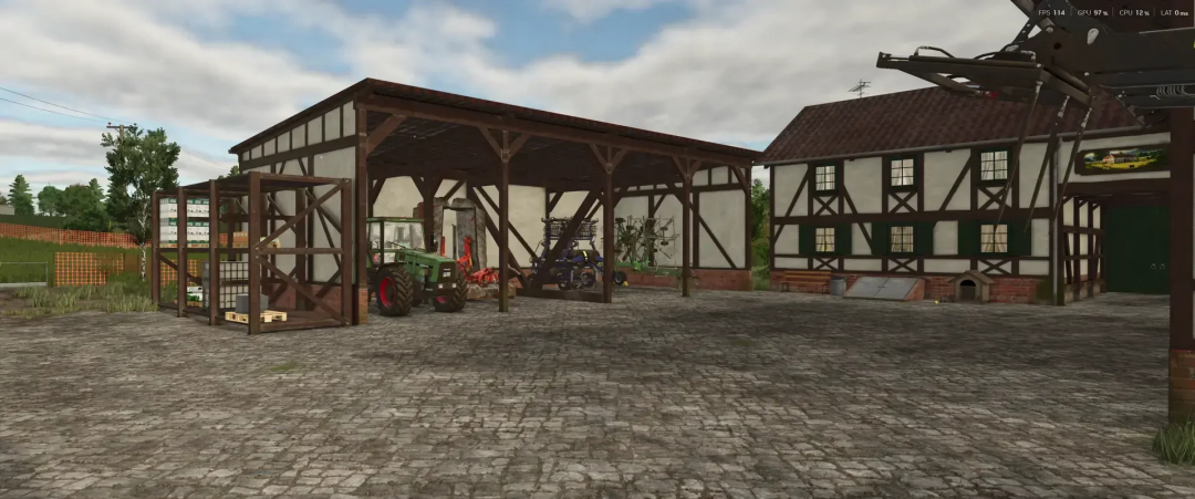 Half-timbered building pack in Eifel style for FS25, showcasing a courtyard with tractors and machinery.