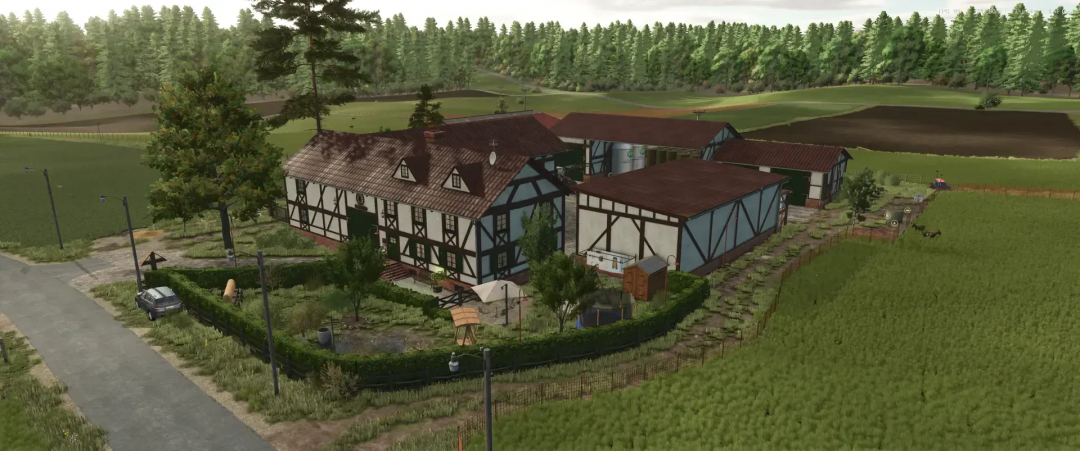 FS25 mod showing half-timbered buildings styled after the Eifel region.