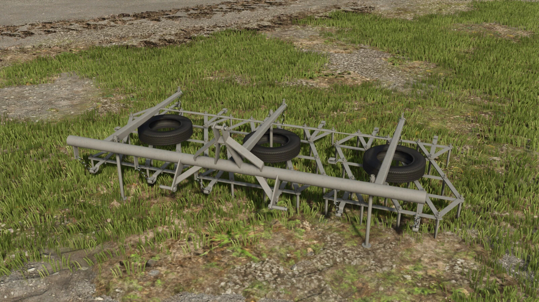 FS25 Harrows mod v1.0.0.0 showcasing metal frame with tires in grass field